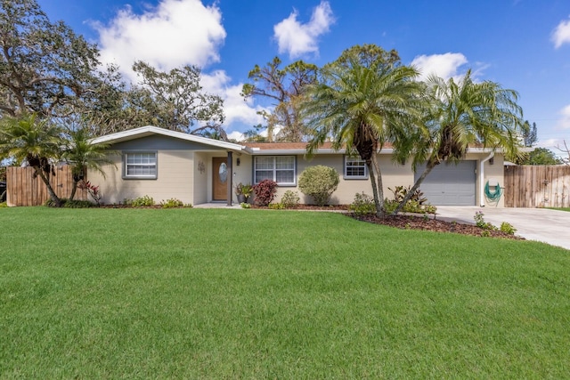 ranch-style house with a garage, concrete driveway, a front lawn, and fence