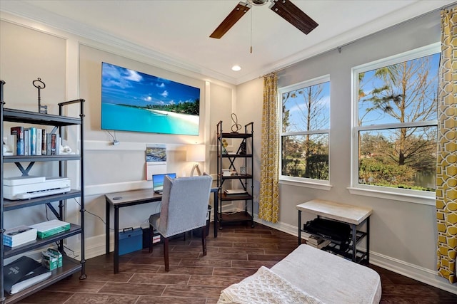 office with ornamental molding, wood finish floors, a ceiling fan, and baseboards