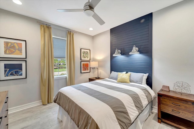 bedroom featuring a ceiling fan, light wood-type flooring, baseboards, and recessed lighting