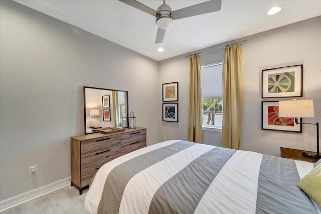 bedroom with a ceiling fan, recessed lighting, and baseboards