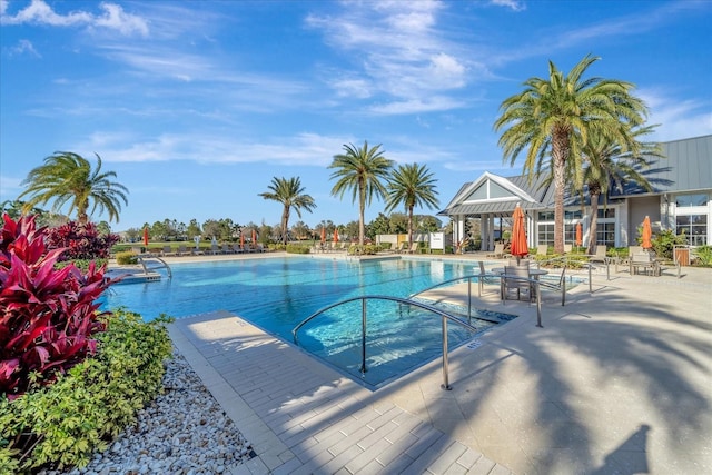 pool with a patio area