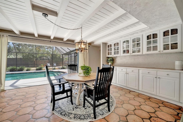 dining area with wooden ceiling and beam ceiling