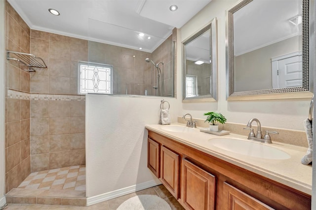 full bathroom featuring tile patterned floors, double vanity, a sink, and a walk in shower