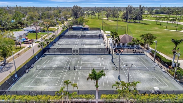 birds eye view of property with golf course view