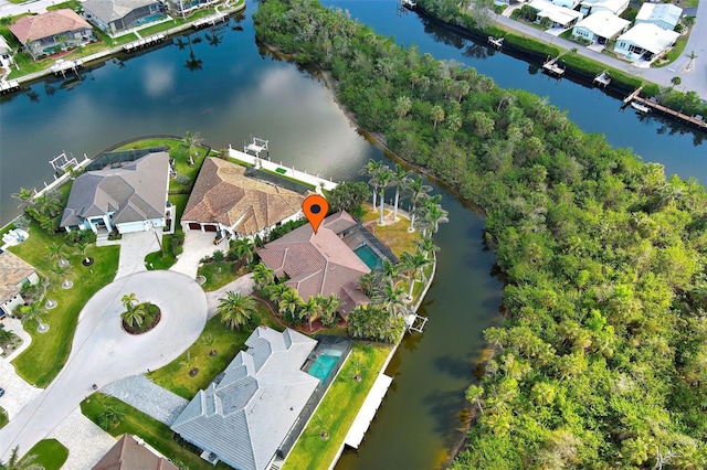 aerial view featuring a water view and a residential view