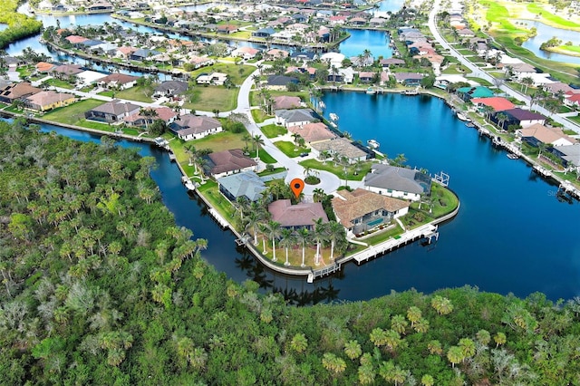 bird's eye view with a water view and a residential view