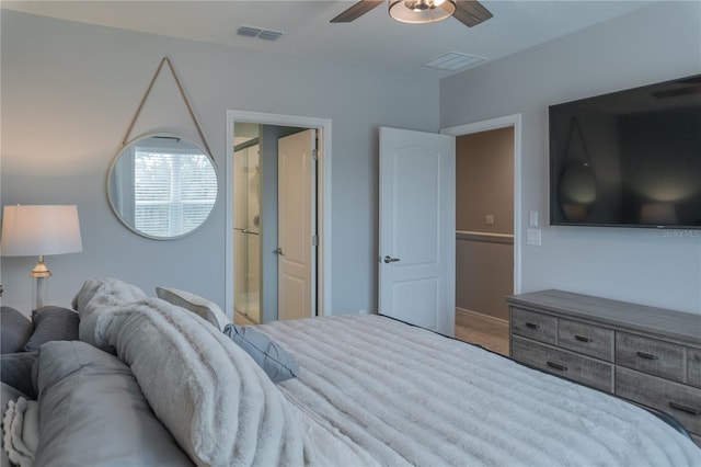 bedroom featuring ceiling fan, visible vents, and connected bathroom