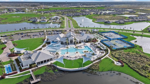 aerial view with a water view and a residential view