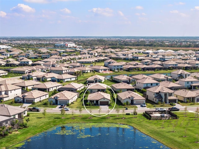 aerial view featuring a water view and a residential view