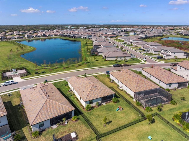 aerial view featuring a water view and a residential view