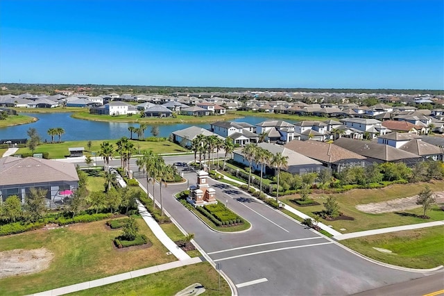 aerial view featuring a water view and a residential view