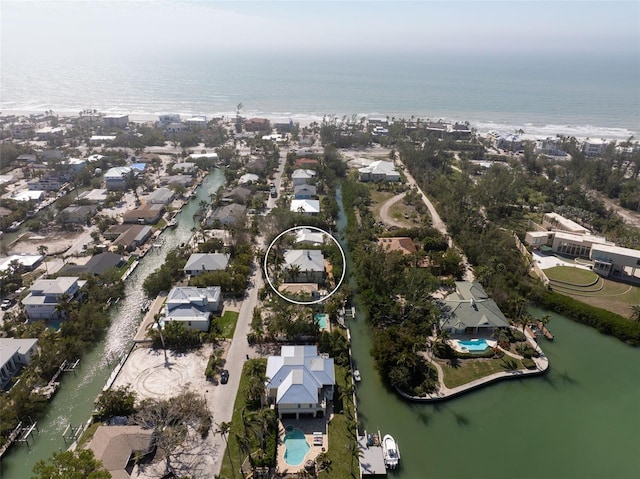 aerial view with a residential view and a water view