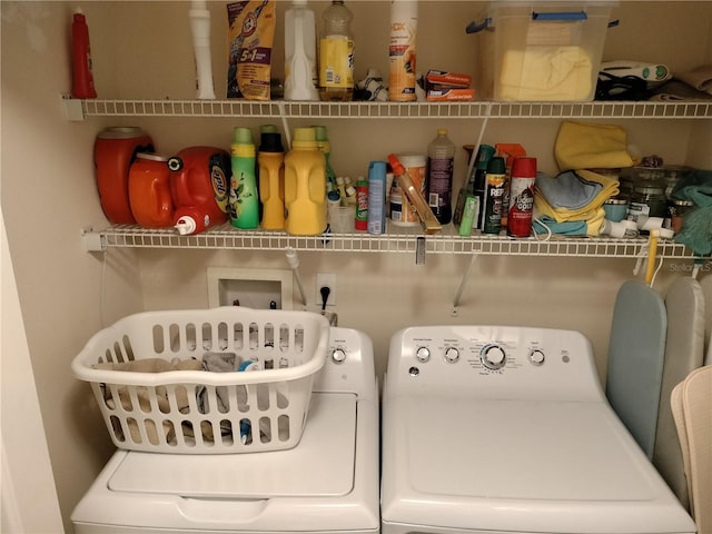 laundry area with laundry area and independent washer and dryer