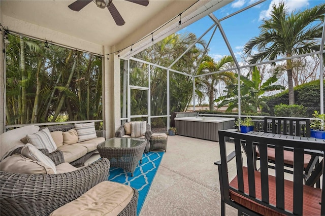 sunroom featuring a ceiling fan