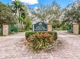 community sign with decorative driveway