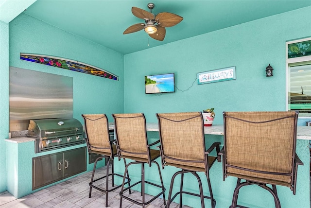 dining space featuring a ceiling fan