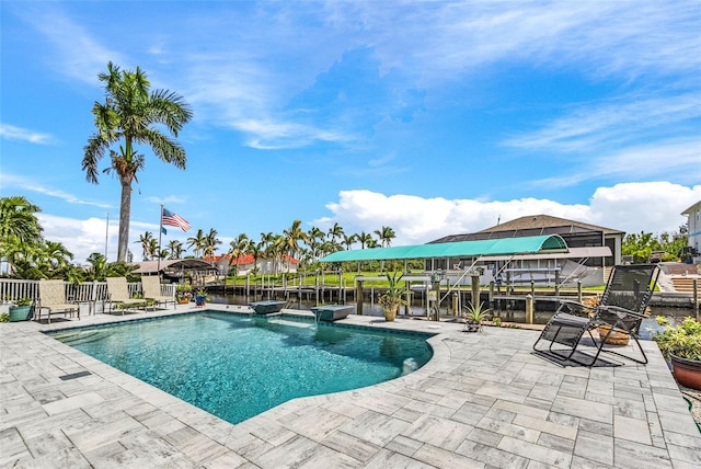 view of pool with a water view, fence, and a fenced in pool