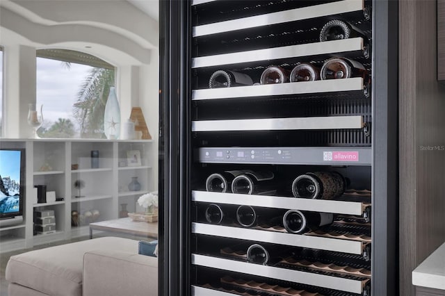 wine cellar featuring wine cooler