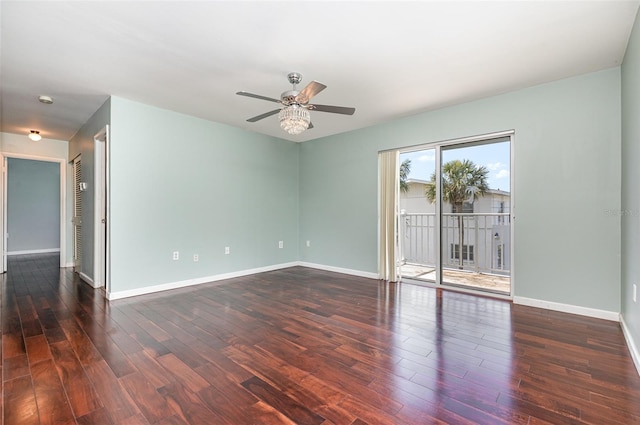 unfurnished room featuring ceiling fan, baseboards, and wood finished floors