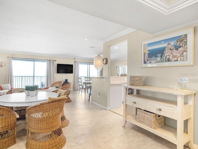 dining area featuring ornamental molding, recessed lighting, and baseboards