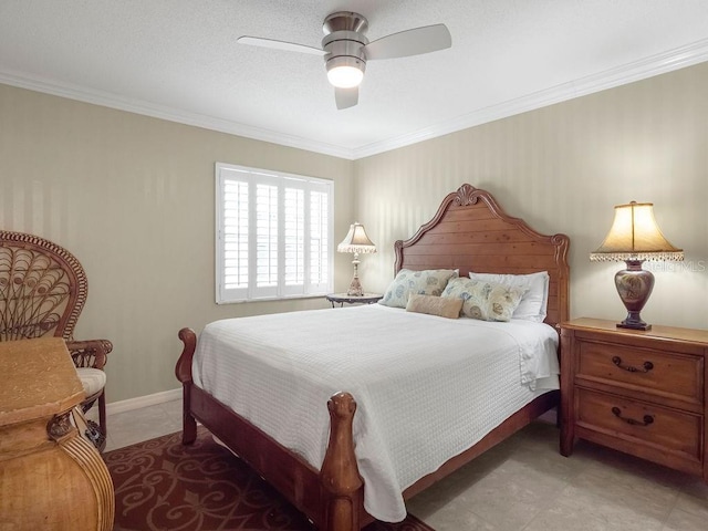 bedroom featuring baseboards, ceiling fan, and crown molding