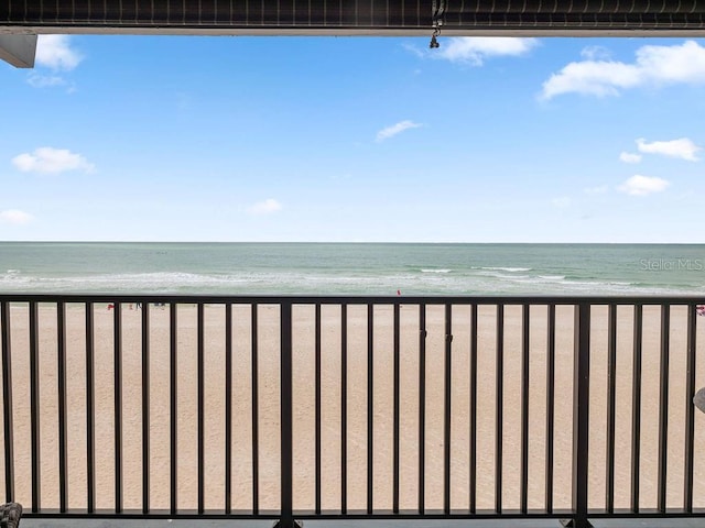 view of water feature with a beach view