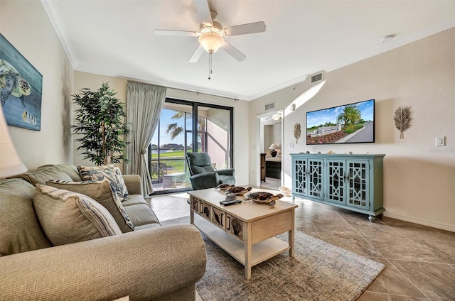 living area with ceiling fan, ornamental molding, and visible vents