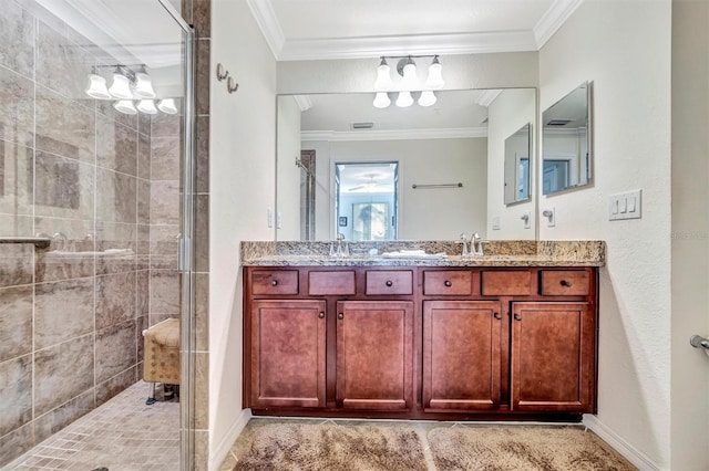 full bath with a stall shower, crown molding, a sink, and double vanity