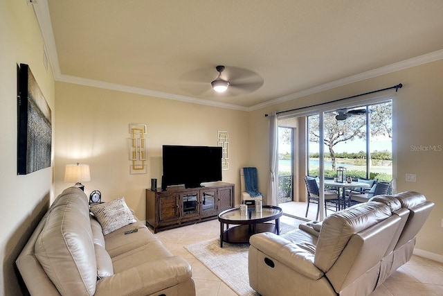 living area with a ceiling fan, crown molding, baseboards, and light tile patterned floors