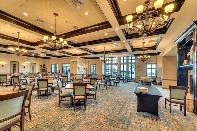 dining room with a chandelier and carpet flooring