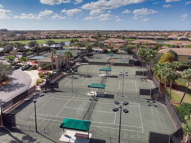 birds eye view of property with a residential view