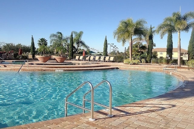 community pool featuring a patio