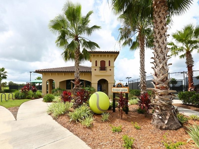 view of community with fence