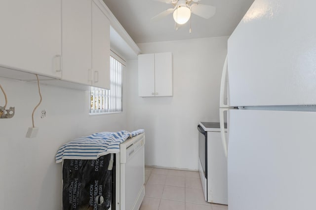 kitchen featuring white appliances, light tile patterned floors, ceiling fan, light countertops, and white cabinetry