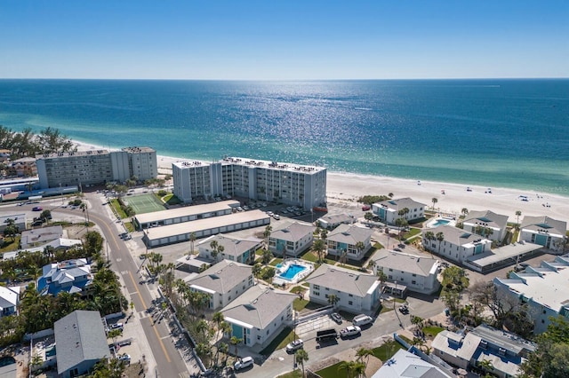 drone / aerial view with a water view and a view of the beach