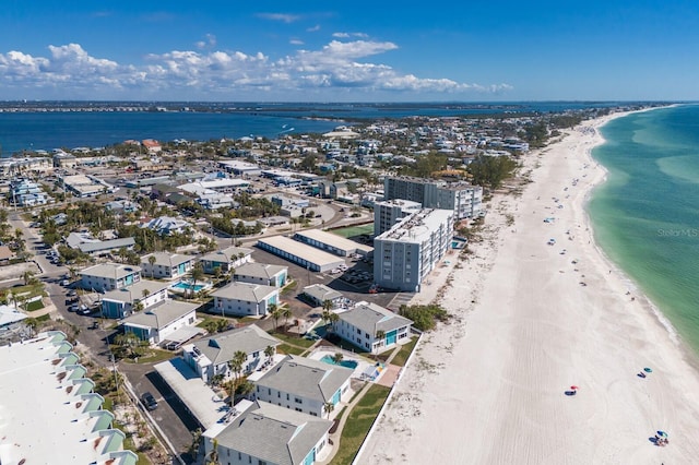 bird's eye view with a water view and a view of the beach