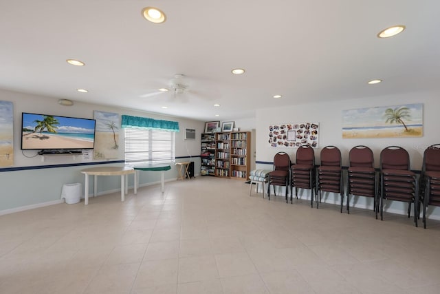 interior space with a ceiling fan, recessed lighting, and baseboards