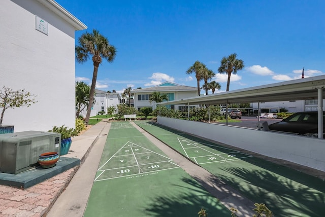 view of community with shuffleboard