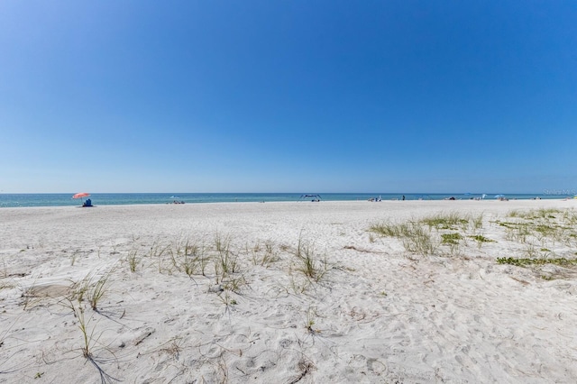 property view of water with a beach view