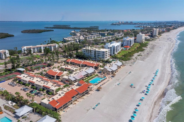 aerial view featuring a water view and a view of the beach