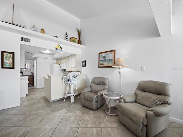 4621 Gulf Of Mexico Dr Unit 19B, Longboat Key, FL 34228 - sitting room with baseboards