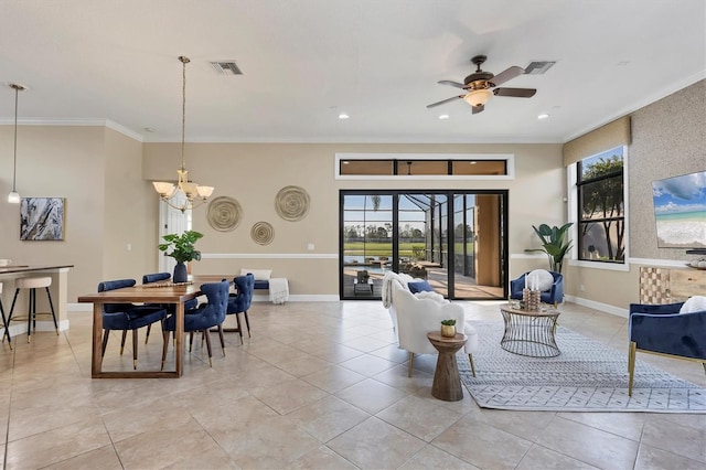 dining area featuring ornamental molding, visible vents, and baseboards