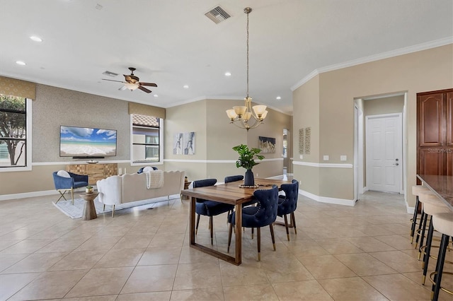 dining area with recessed lighting, baseboards, visible vents, and ornamental molding