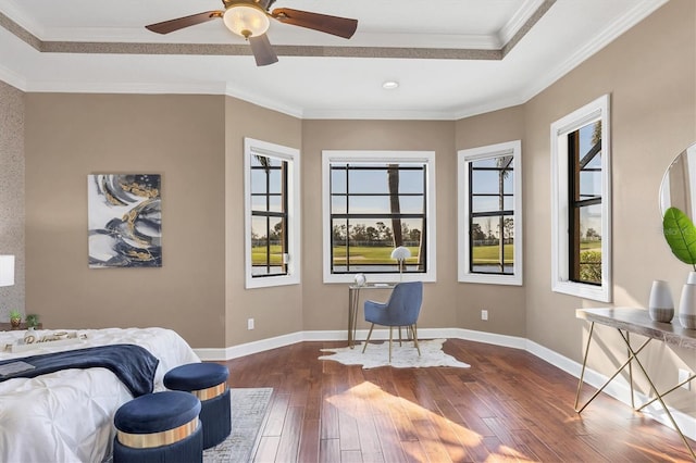 bedroom with dark wood-style floors, ornamental molding, multiple windows, and baseboards