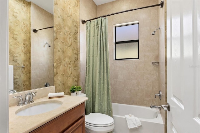 full bath with vanity, toilet, and shower / bath combo with shower curtain