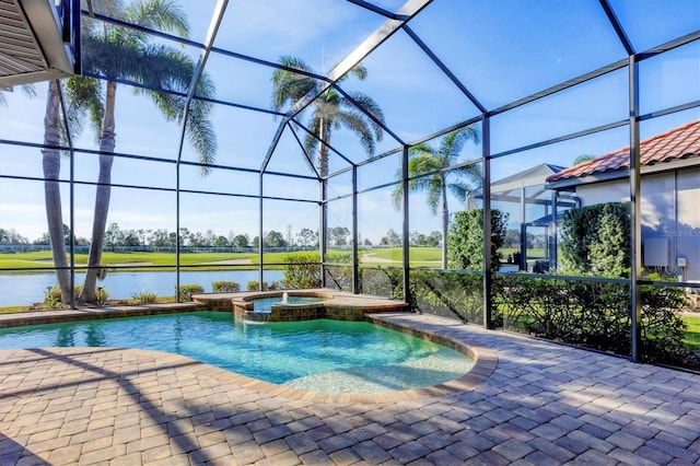 view of swimming pool with a pool with connected hot tub, glass enclosure, a water view, and a patio