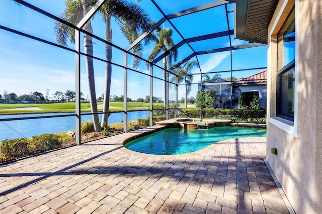 view of swimming pool featuring a water view, glass enclosure, a pool with connected hot tub, and a patio area