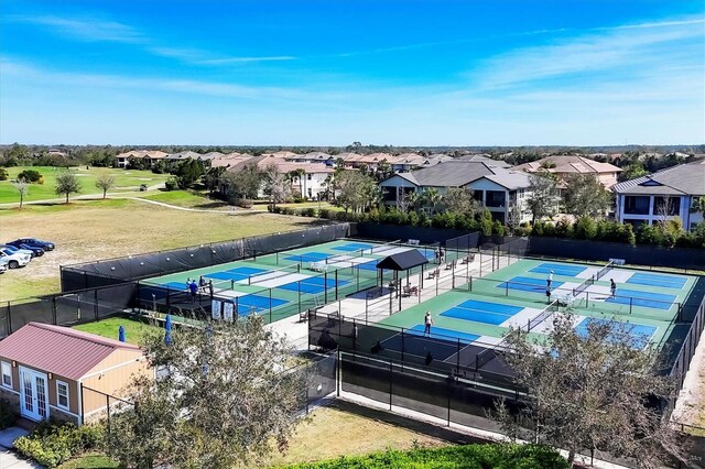 birds eye view of property with a residential view