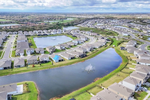 aerial view featuring a water view and a residential view