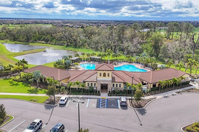 drone / aerial view with a water view